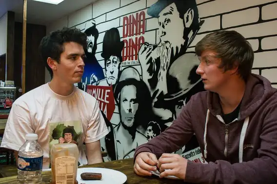 
					two fellas in a cafe