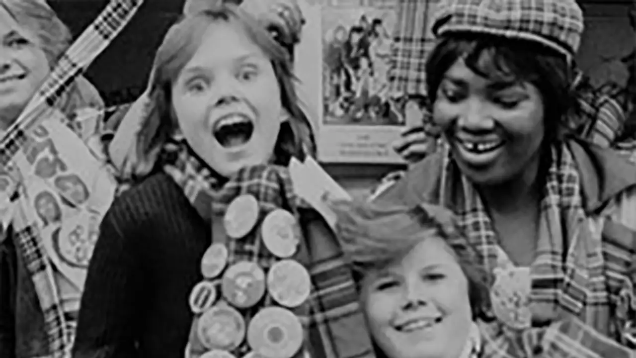 old photo
					from the 80s with loads of kids laughing